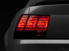 Raxiom 99-04 Ford Mustang Excluding 99-01 Cobra Tail Lights- Black Housing (Smoked Lens) Raxiom